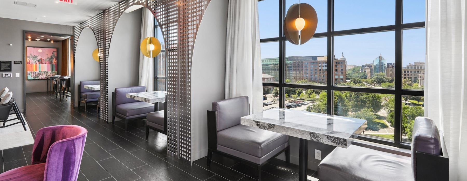a room with tables and chairs