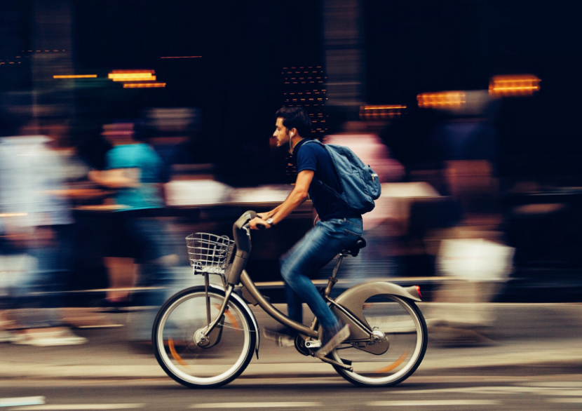 Resident riding on his bicycle near our Washington, DC apartments