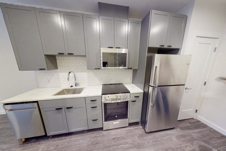 Kitchen with stainless steel appliances at our apartments in Mountain Vernon Triangle, DC